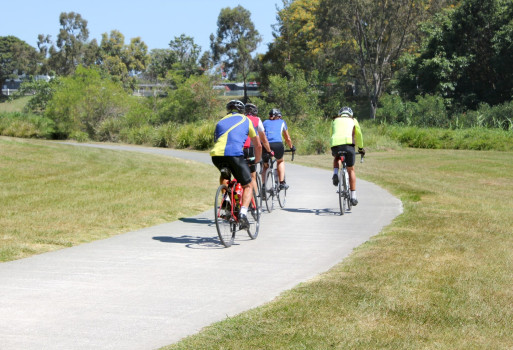 Cyclists riding their bikes together